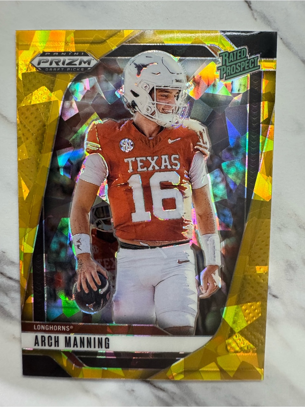 2025 Arch Manning Panini Prizm GOLD Rated Prospect card. Perfect Condition